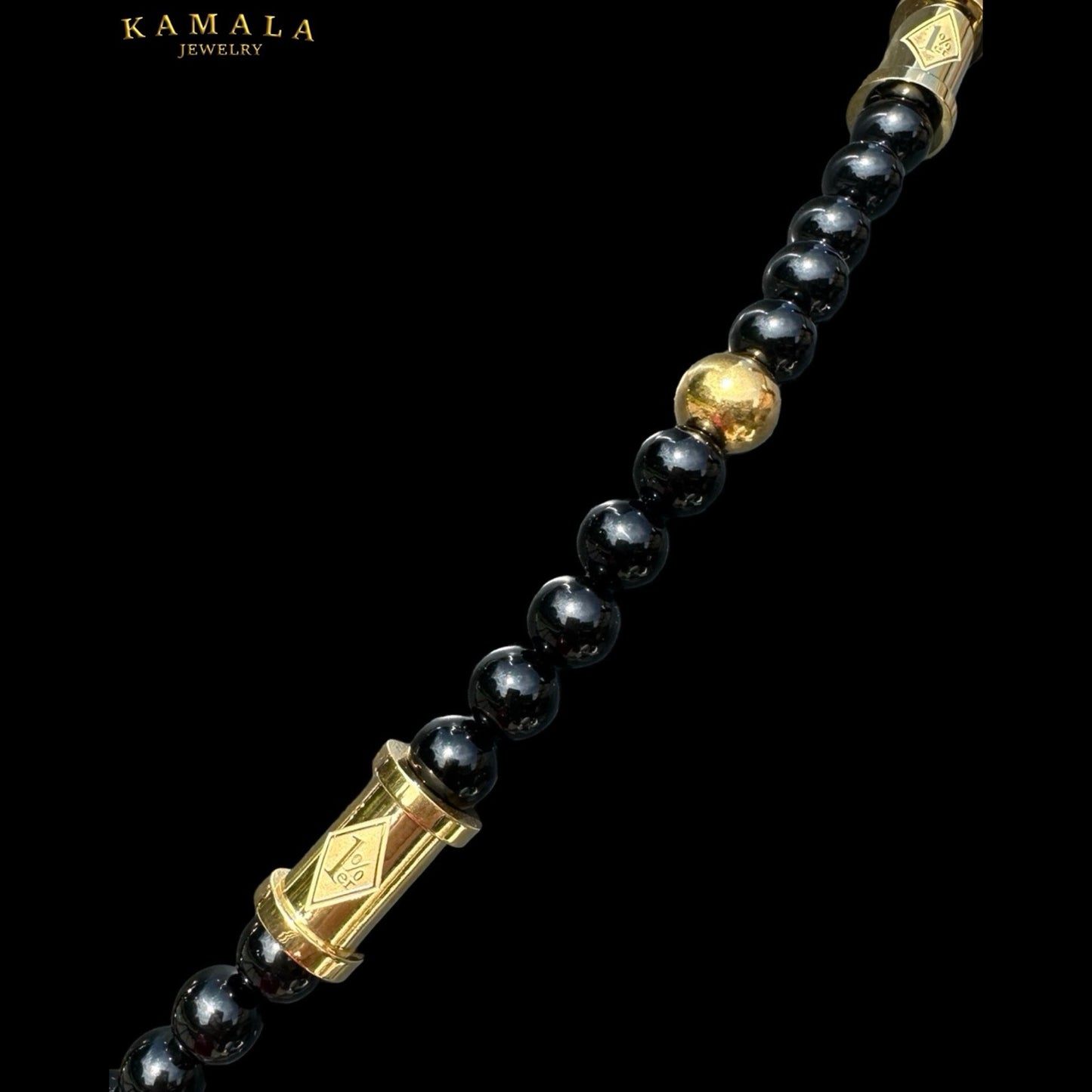 1%er Perlenkette aus Onyx und Goldene Perlen