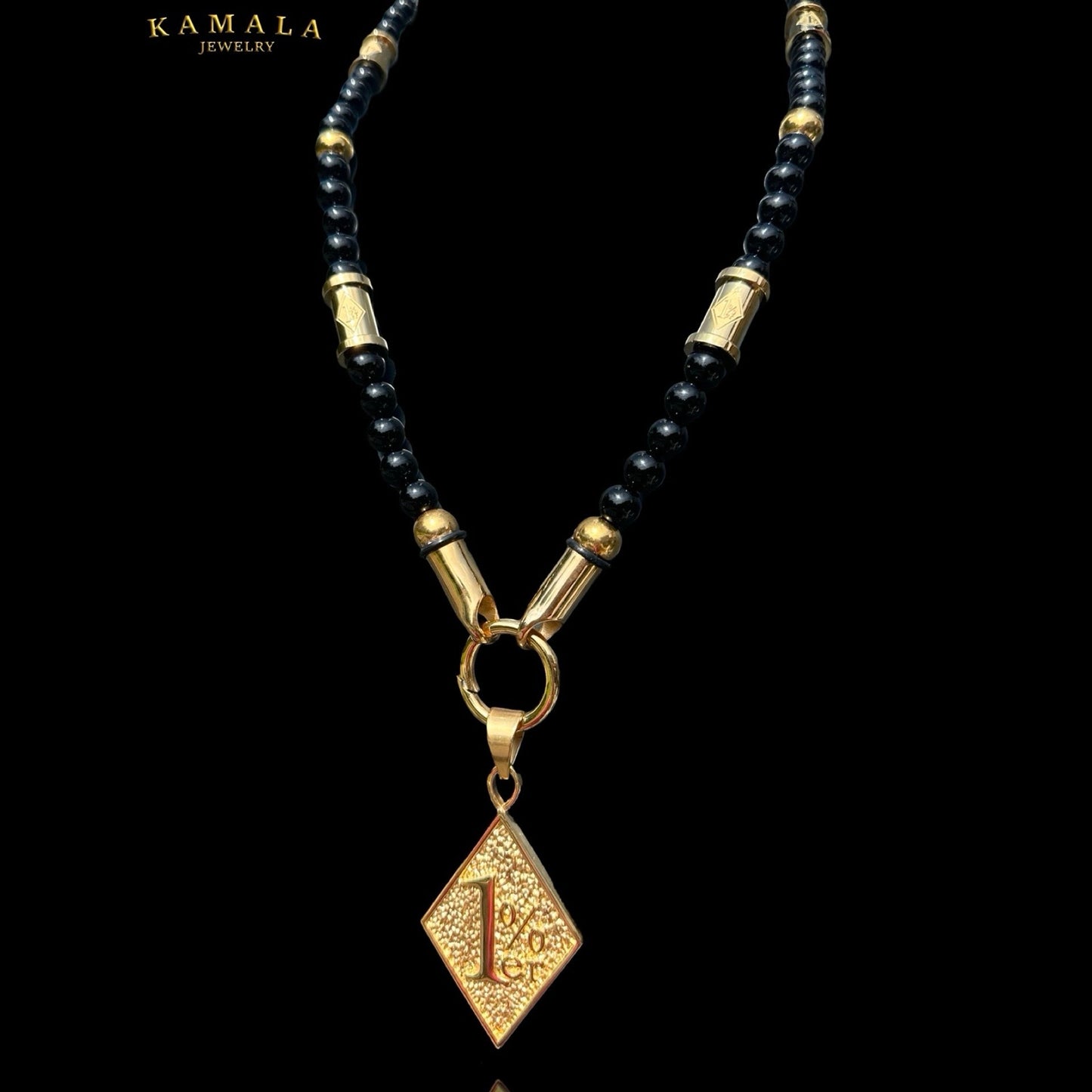 1%er Perlenkette aus Onyx und Goldene Perlen